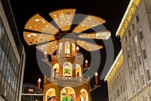 Beautiful traditional German Christmas Market square in Magdeburg city center Germany with Christmas Pyramide many