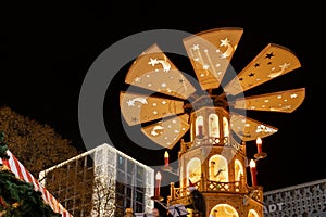 Beautiful traditional German Christmas Market square in Magdeburg city center Germany with Christmas Pyramide many