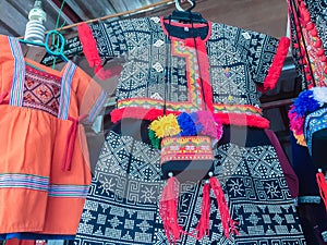 Beautiful traditional handmade clothes for sale to the tourist as the souvenir at the local market in hill tribe minority village