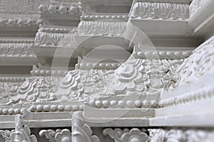 Beautiful Traditional Thai stucco designs on pillars, Thai art, texture pillar at Temple and palace