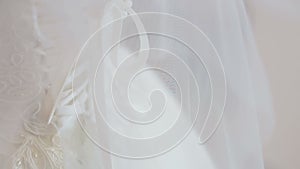 A beautiful traditional white wedding dress detail