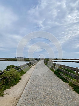 Trail to Praia do Barril beach in the Ria Formosa natural park in Luz de Tavira photo