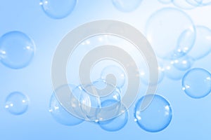 Beautiful Transparent Blue Soap Bubbles Abstract Background. Soap Sud Bubbles Water.