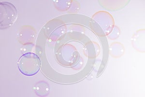 Beautiful transparent colorful pink and blue soap bubbles float texture background. freshness natural summer background.