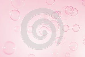 Beautiful Transparent Pink soap Bubbles Float Background.