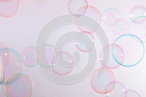 Beautiful transparent pink soap bubbles floating in the air. Abstract, Celebration, Natual fresh summer background.