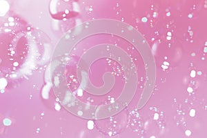 Beautiful Transparent Shiny Soap Bubbles Floating on Pink Background. Pink Textured