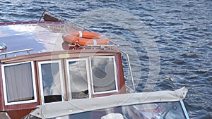 beautiful trip yacht in retro style floating on dock. sunny day. close up