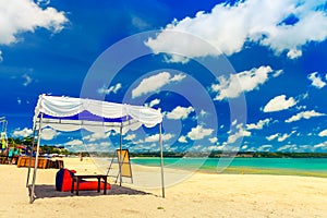 Beautiful tropical beach island bali with sandy beach and azure clean sea water on background scenery clear blue sky, Indonesia