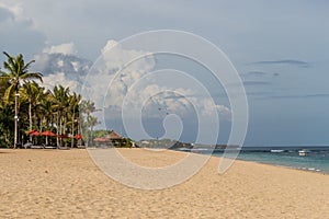 Beautiful tropical beach with lush vegetation