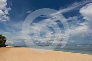 Beautiful tropical beach with lush vegetation