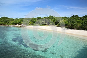 Beautiful tropical beach with turquoise sea & golden sand on Green Island, Antigua, Caribbean