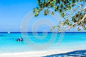 Beautiful tropical beach, white sand and blue sky background.