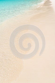 Beautiful tropical beach, white sand and blue sky background.