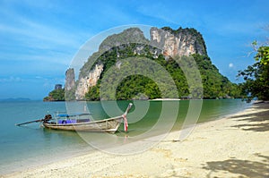 Beautiful tropical island and longtail boat