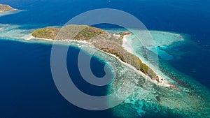 Beautiful tropical island with white beach, top view. Malcapuya Island photo