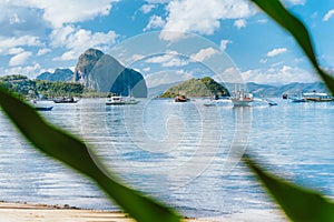 Beautiful tropical landscape. El-Nido, Philippines. Banca boats resting on tranquil early morning at Corong Corong lagoon