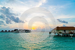 Beautiful tropical Maldives resort hotel and island with beach and sea