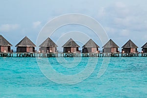 Beautiful tropical Maldives resort and island with beach and sea