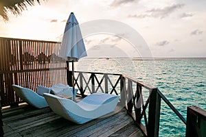 Beautiful tropical Maldives resort and island with beach and sea