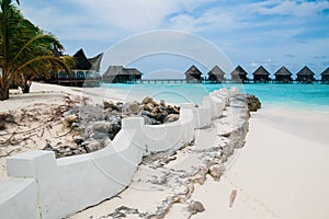 Beautiful tropical Maldives resort and island with beach and sea
