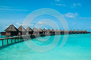 Beautiful tropical Maldives resort and island with beach and sea