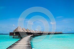 Beautiful tropical Maldives resort and island with beach and sea