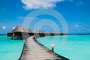 Beautiful tropical Maldives resort and island with beach and sea