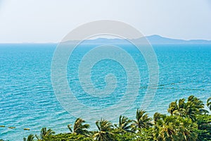 Beautiful tropical nature of beach sea ocean bay around coconut palm tree