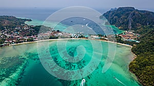 Beautiful tropical panorama landscape with boat in the ocean at Phi Phi islands in Thailand.