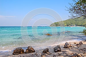 Beautiful Tropical sea beach in KohLarn , Chonburi, Thailand with mountain and blue sky