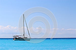 Beautiful turquoise blue sea background with boat.