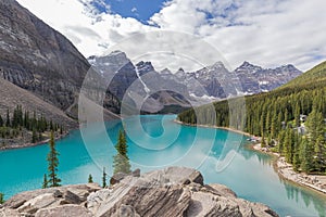 Beautiful turquoise water surround with taiga forest and rocky mountain in summer morning at Moraine Lake,Alberta Canada