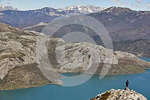 Beautiful turquoise waters reservoir and mountain landscape in Riano. Spain photo