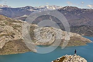 Beautiful turquoise waters reservoir and mountain landscape in Riano. Spain photo