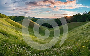 Beautiful Tuscany landscape with green meadows and blue sky