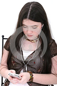 Beautiful Tween Girl Listening To Music