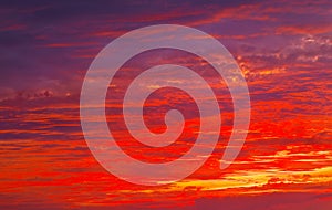 Beautiful Twilight sky background. Colorful Fiery orange and red sunset sky