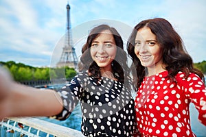 Beautiful twin sisters in Paris, France