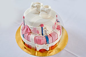 Beautiful two-layer pink and white birthday cake