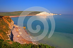 Beautiful UK coast Seven Sisters chalk cliffs East Sussex uk between Seaford and Eastbourne with clear blue sea