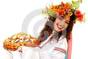 Beautiful ukrainian young hospitable woman in native costume by