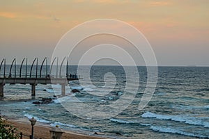 Beautiful Umhlanga Promenade Pier a whalebone made pier in Kwazulu Natal Durban North South Africa during sunset