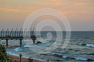 Beautiful Umhlanga Promenade Pier a whalebone made pier in Kwazulu Natal Durban North South Africa during sunset