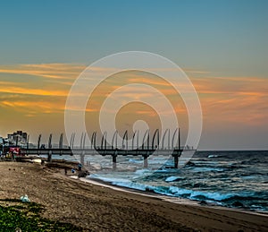 Beautiful Umhlanga Promenade Pier a whalebone made pier in Kwazulu Natal Durban North South Africa during sunset