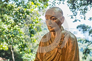Beautiful unique buddha statue close shot, looking sad