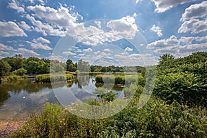 Beautiful unspoiled English country lake landscape. Rural vacation getaway destination. photo