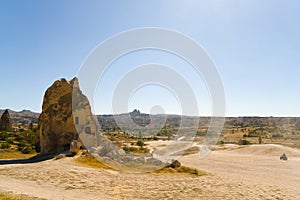 Beautiful unusual landscape of mountainous Cappadocia with cave dwellings