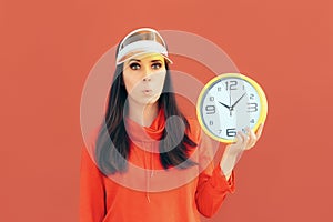 Beautiful Urban Fashion Girl Holding Clock on Red Background