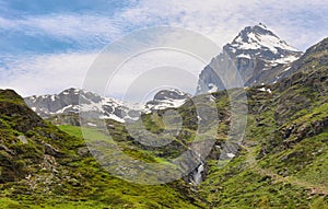 Beautiful valley in the way to Rifugio Benevolo with Granta Parey Peak at background, Val d`Aosta, Italy